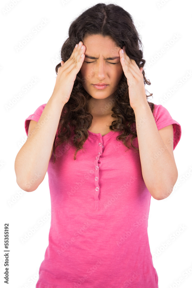 Young cute brunette suffering from headache Young cute brunette suffering from headache