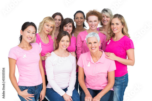 Voluntary cheerful women posing and wearing pink for breast canc photo