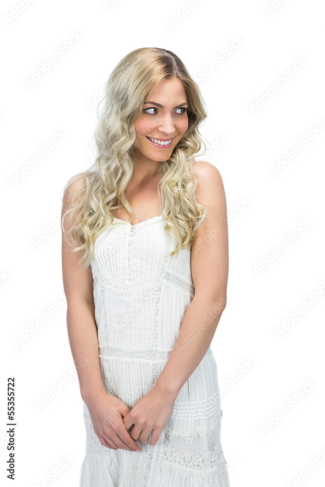 Reserved sensual model in white dress posing Reserved sensual model in white dress posing