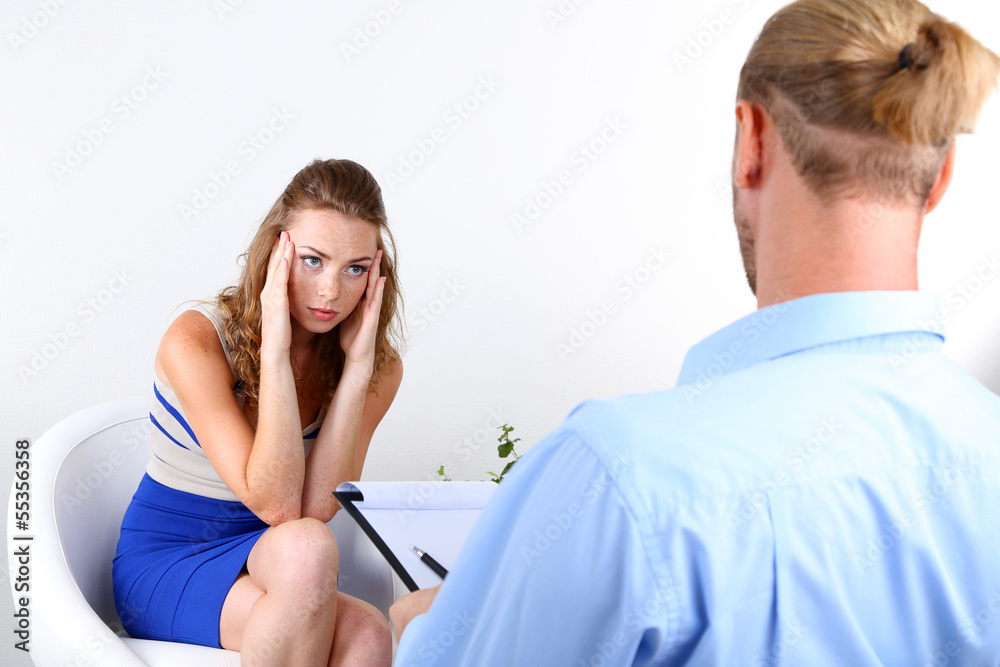 Obraz premium Woman with problem on reception for psychologist