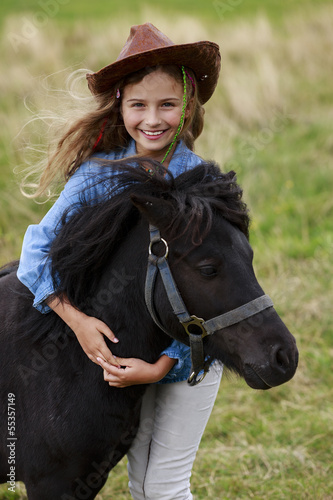 Ranch - Lovely girl with pony on the ranch © Gorilla