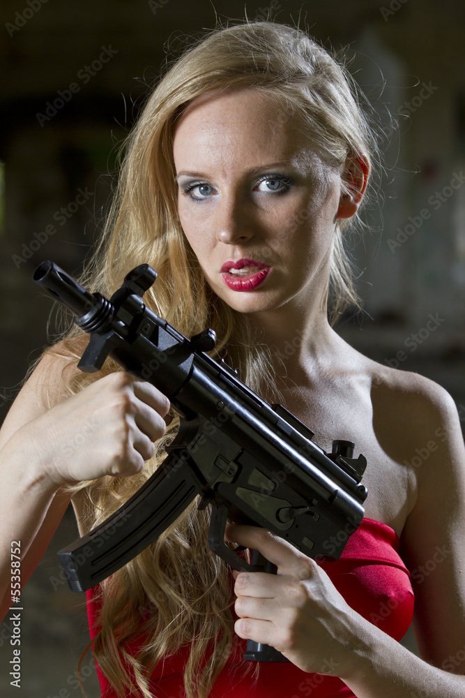 Seductive Spy with automatic gun