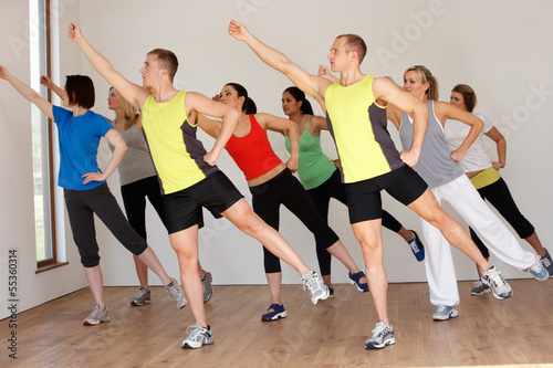 Group Of People Exercising In Dance Studio #55360314