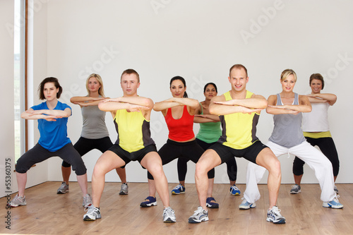 Group Of People Exercising In Dance Studio #55360375