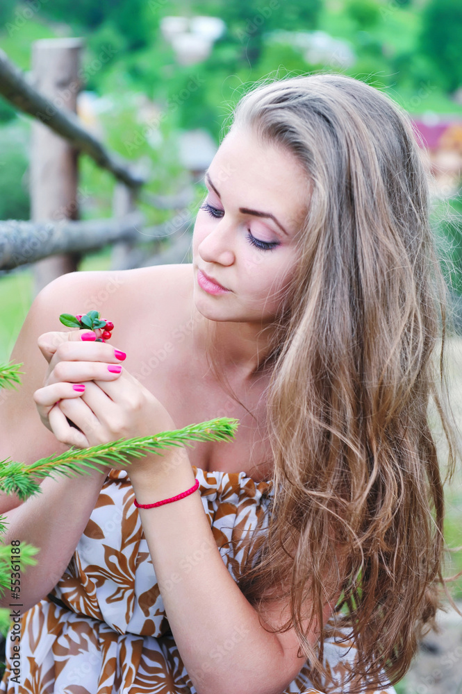 Portrait of an young beautiful woman on the nature Portrait of an young beautiful woman on the nature