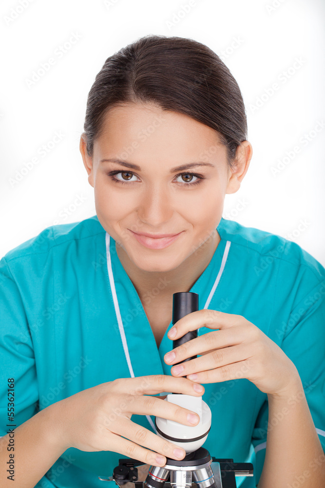 Woman with microscope. Cheerful young woman in lab coat holding Woman with microscope. Cheerful young woman in lab coat holding