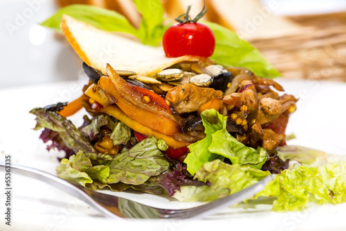 salad with vegetables and meat on  restaurant