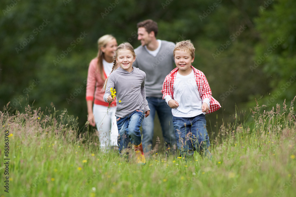 Family On Walk In Countryside