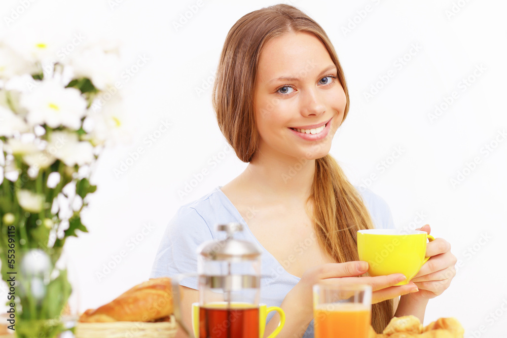 Beautiful young woman drinking tea Beautiful young woman drinking tea