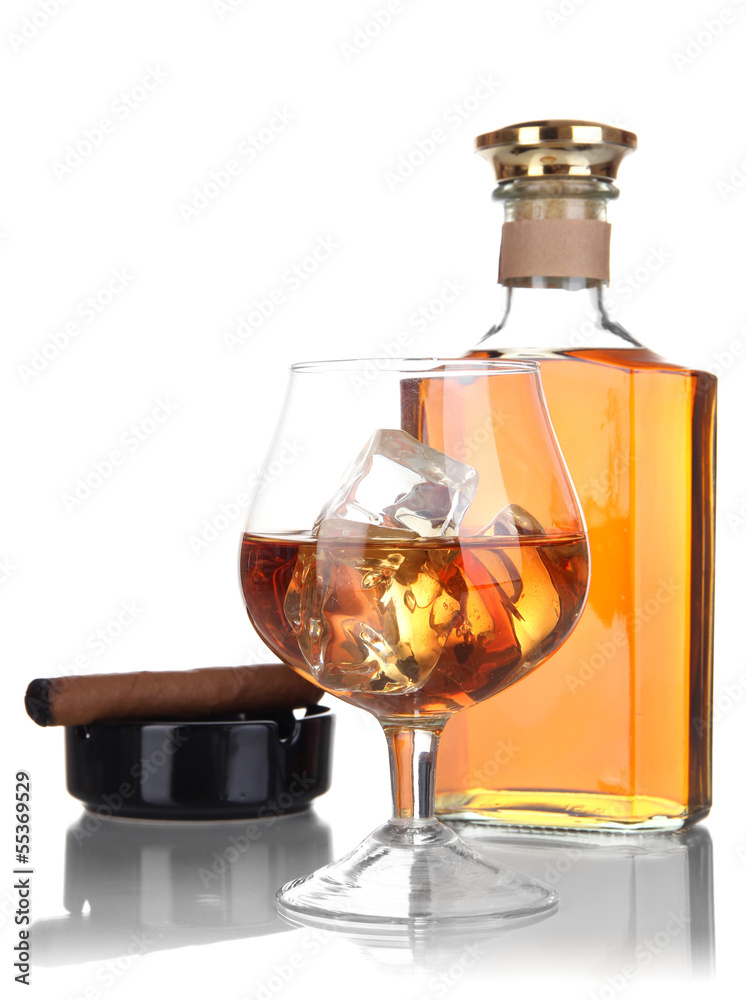 Brandy with ice and cigar isolated on white Brandy with ice and cigar isolated on white