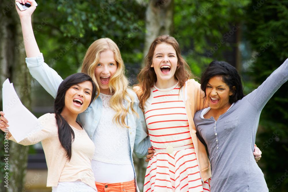 Four Teenage Girls Celebrating Successful Exam Results