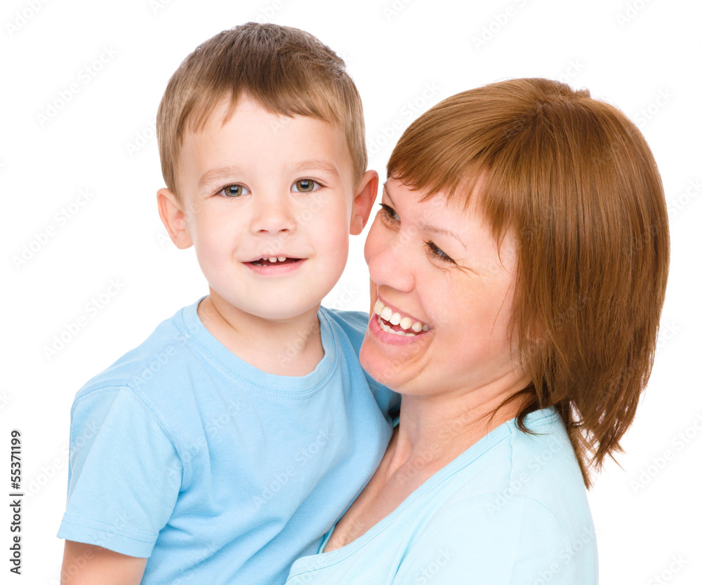 Portrait of a happy mother hugging her son Portrait of a happy mother hugging her son