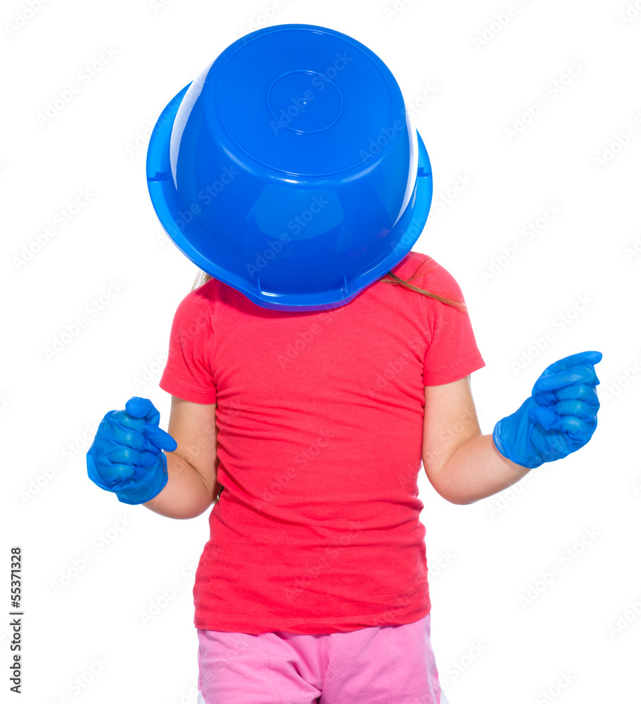 Little girl put a blue bucket on her head