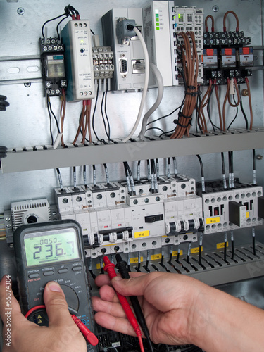 Engineer makes maintenance of power network automation