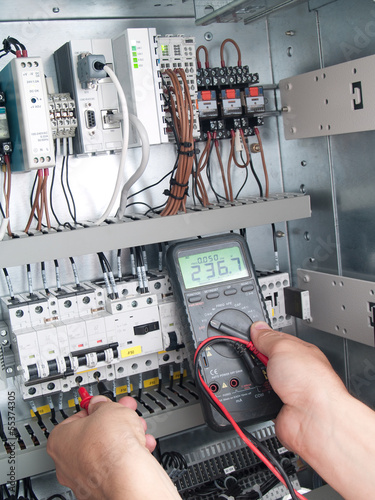 Engineer makes maintenance of power network automation
