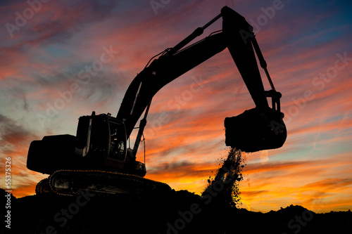 track-type loader excavator at work photo