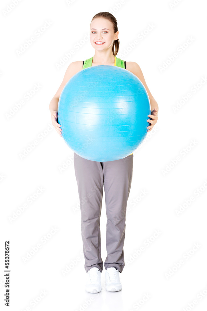 Healthy lifestyle woman with pilates exercise ball. Healthy lifestyle woman with pilates exercise ball.