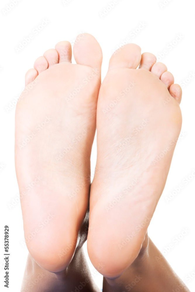 Fototapeta premium Beautiful female a foot and a heel lifted upwards