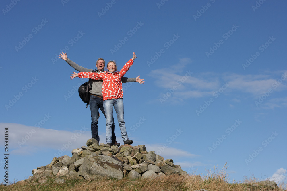 Walkers Standing On Pile Of Rocks Walkers Standing On Pile Of Rocks