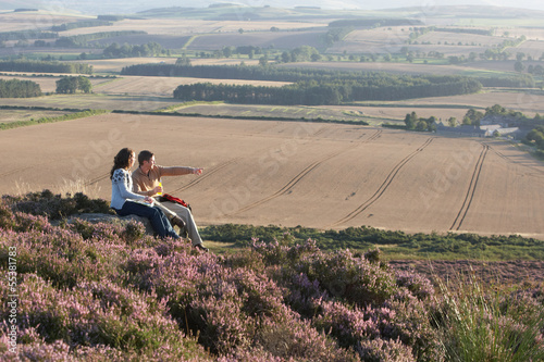 Couple Stopping For Lunch On Countryside Walk