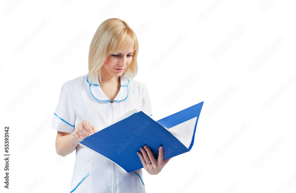 A young nurse looking at medical records of patients A young nurse looking at medical records of patients