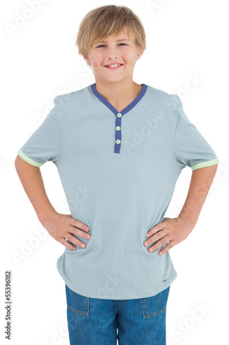 Young child with a blue shirt smiling