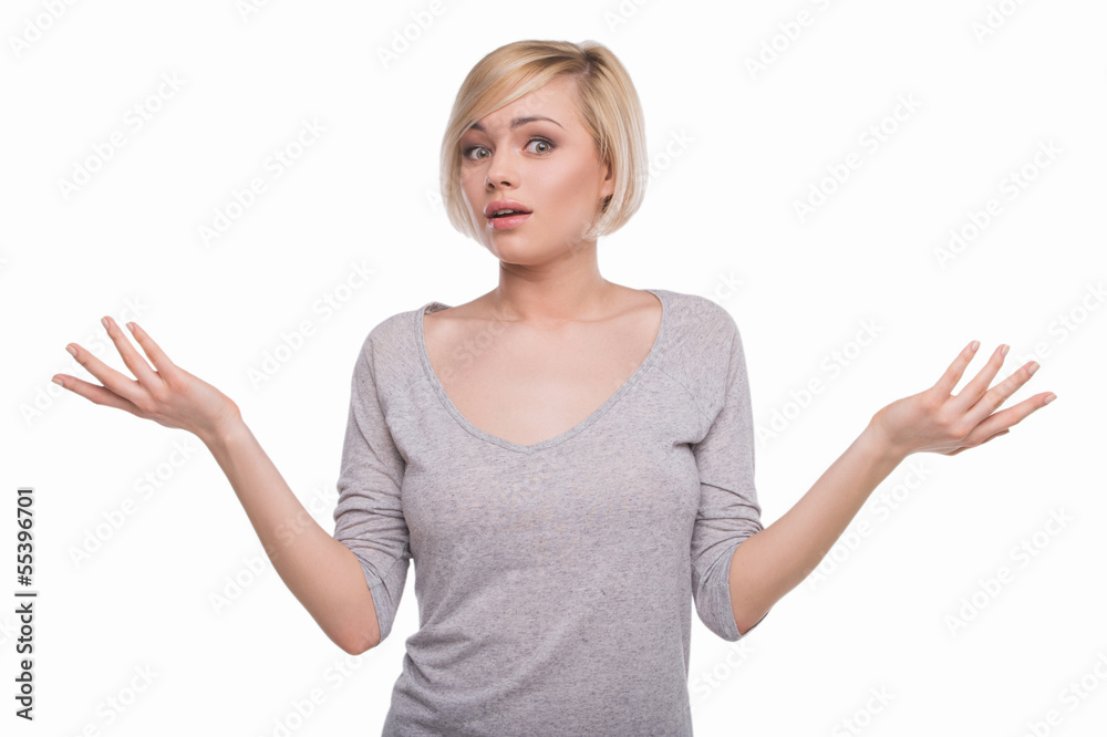 Frustrated woman. Surprised young woman gesturing and looking at Frustrated woman. Surprised young woman gesturing and looking at