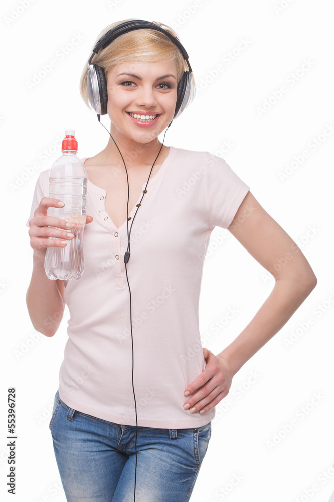 Woman in headphones. Beautiful young blond hair woman in headpho