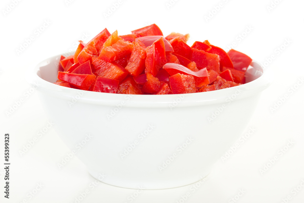 Cutted red peppers in white bowl Cutted red peppers in white bowl