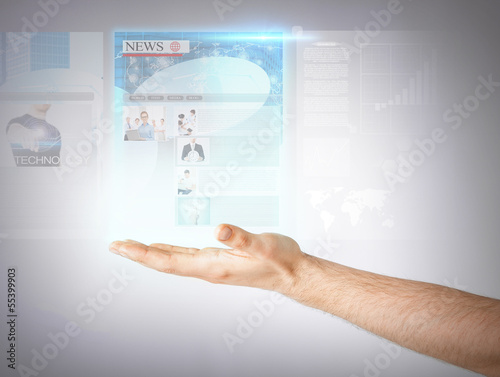 man with virtual screen and news