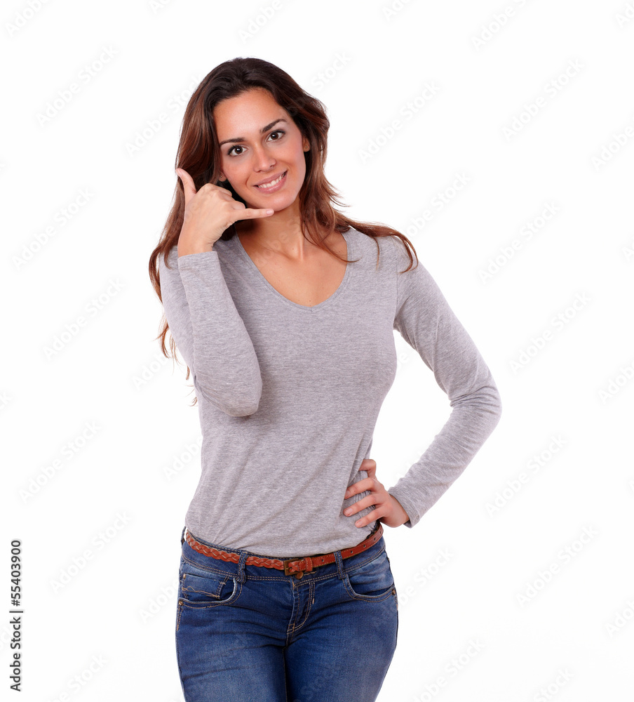 Fototapeta premium Beautiful lady gesturing a call with hand