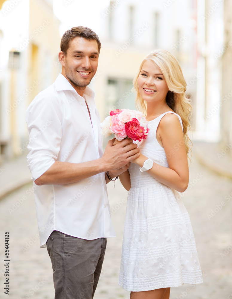 couple with flowers in the city couple with flowers in the city