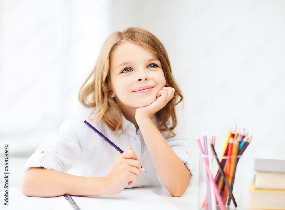 girl drawing with pencils at school girl drawing with pencils at school