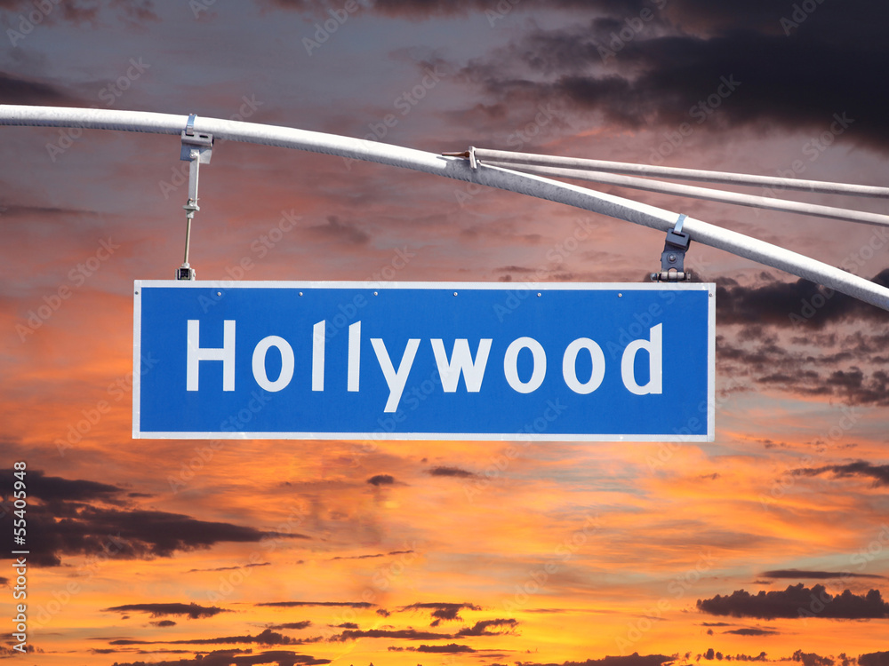 Obraz premium Hollywood Blvd Overhead Street Sign with Sunset Sky
