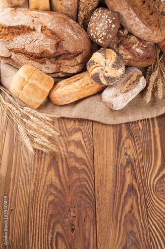 Fresh bread on wood
