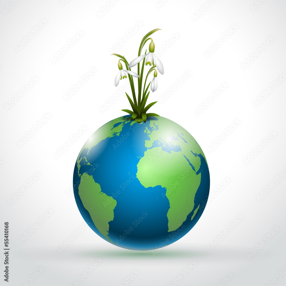 World globe with first spring flowers snodrops World globe with first spring flowers snodrops