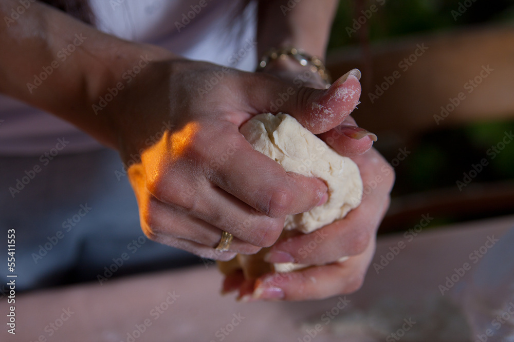 Female hands in flour