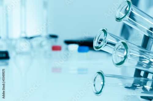 Test tubes closeup on blue background..medical glassware