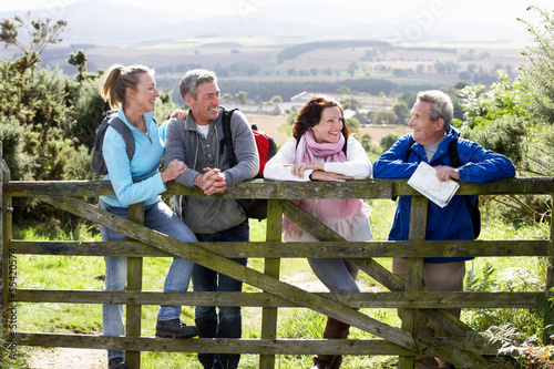 Fotografie Group Of Friends On Country Walk