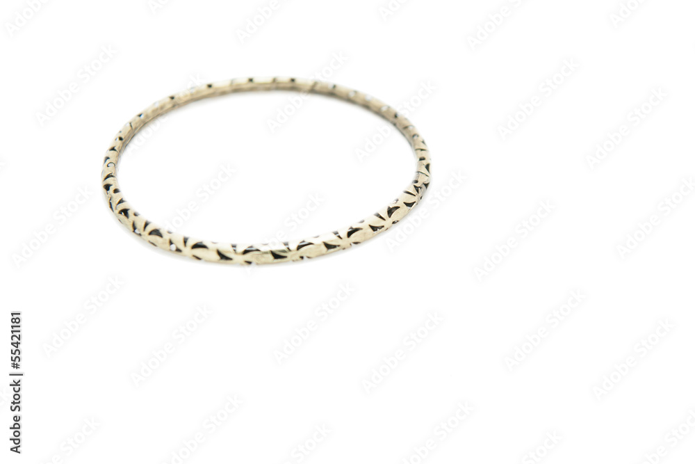 Golden bracelet with heart shape the image isolated on white Golden bracelet with heart shape the image isolated on white