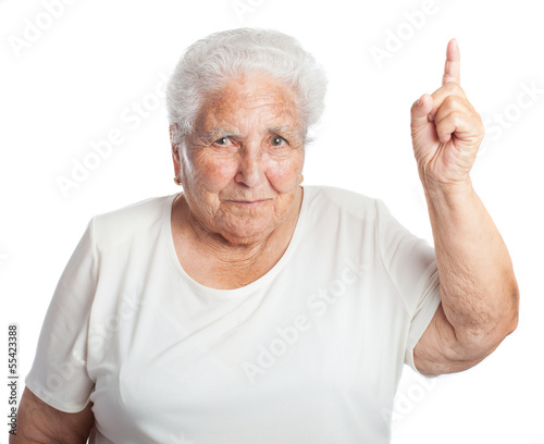 elder women pointing up on a white background