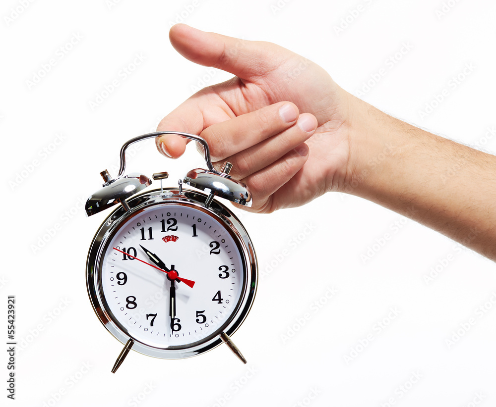 Hand with alarm clock. Hand with alarm clock.
