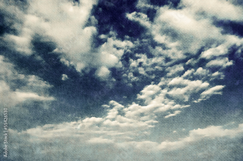 Blue sky with  white puffy clouds