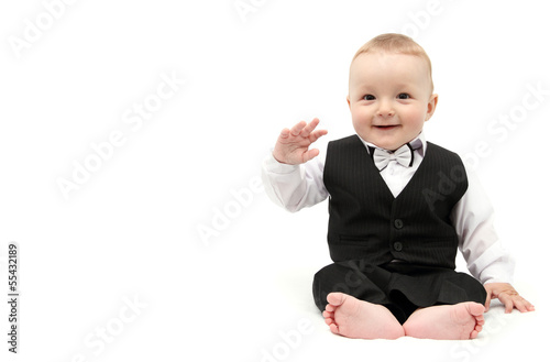 Happy baby boy in suit
