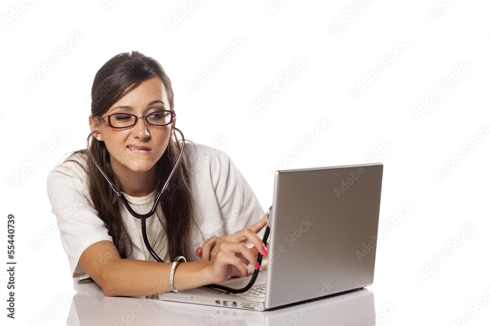 funny doctor examined her computer with a stethoscope funny doctor examined her computer with a stethoscope