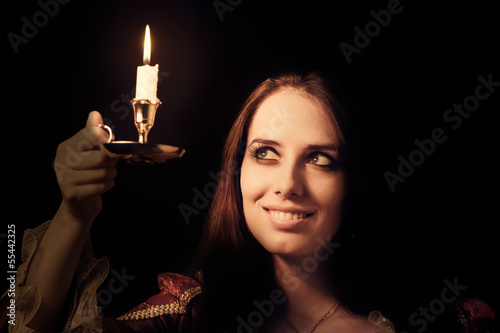 Vászonkép Girl with Candle