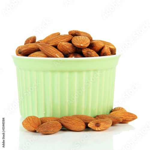 Almond in bowl, isolated on white