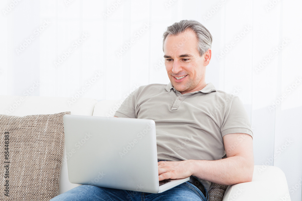 Mature Man using Laptop