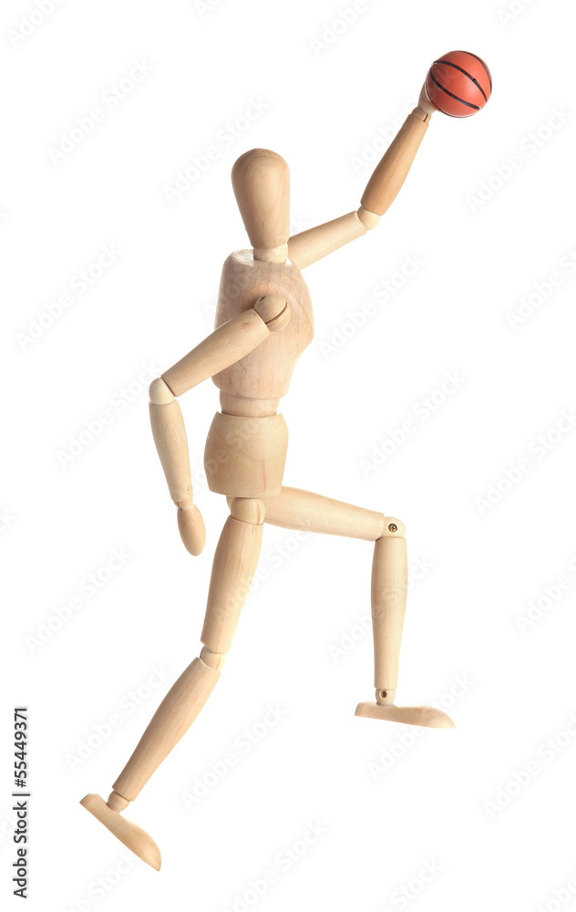 Wooden mannequin with basketball ball on grey background Wooden mannequin with basketball ball on grey background