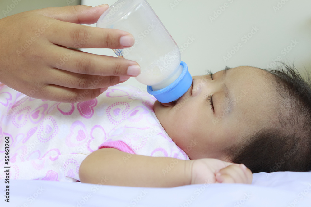 Baby drink milk and sleep